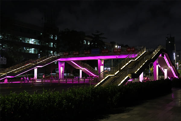 A bridge illuminated with flowing DMX-controlled lights
